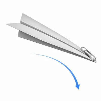 A paper glider with a paper clip on the nose diving downward.