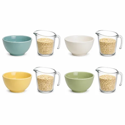Four bowls each paired with a measuring cup filled about three quarters with oats.